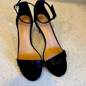 Black heels, never worn